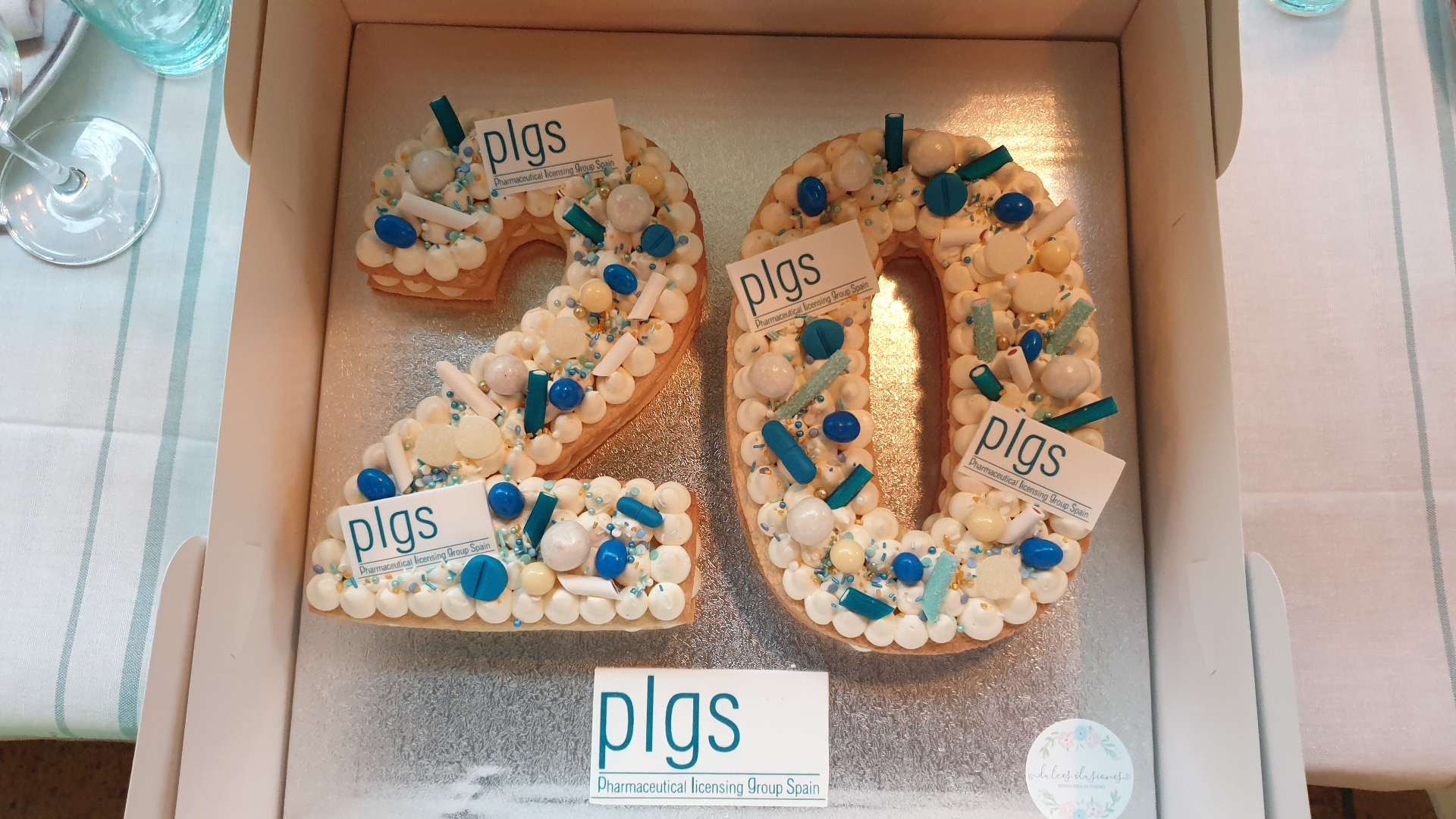 20 aniversario PLGS · detalle de catering personalizado para evento corporativo
